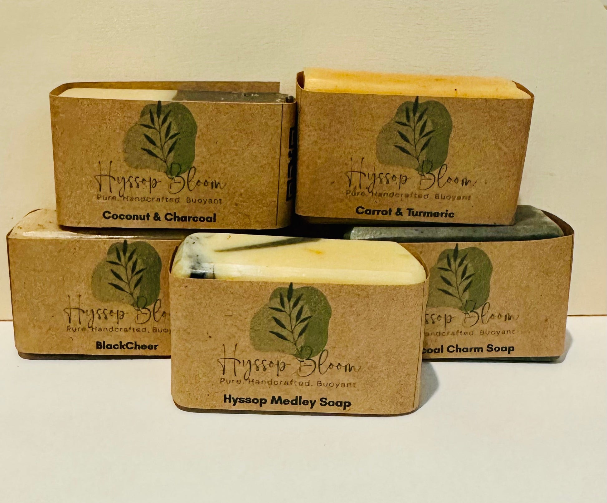 Collection of Hyssop Bloom mini bar soaps and packaging on a white background